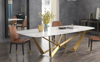 Modern White Marble Dining Table with Golden Geometric Base & Black Chairs –