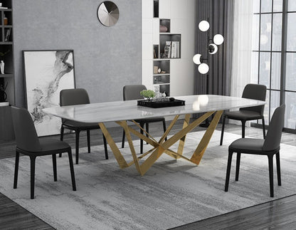 Modern White Marble Dining Table with Golden Geometric Base & Black Chairs –